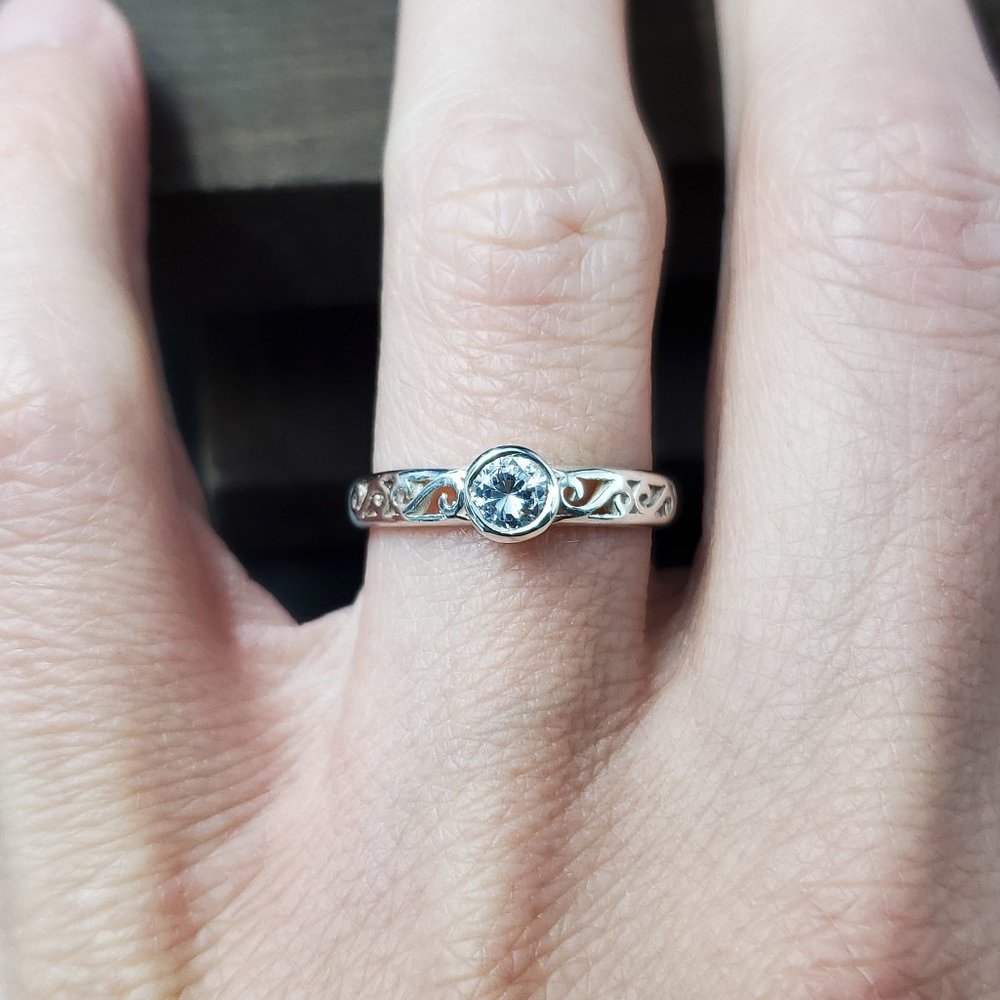 Size 7 Sterling Silver Swirls Accent Cubic Zirconia Ring